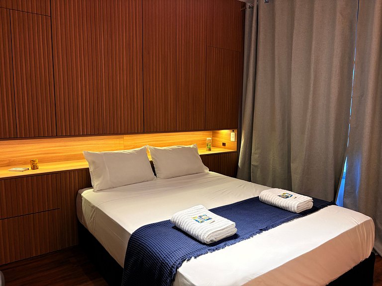 Aconchegante | Cama Queen e Smart TV 50”- HL53