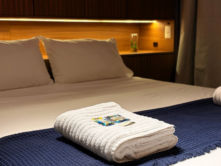 Aconchegante | Cama Queen e Smart TV 50”- HL53